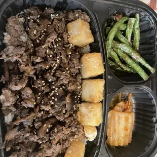 Bulgogi which came with rice, fried tofu, fermented kimchi and green beans