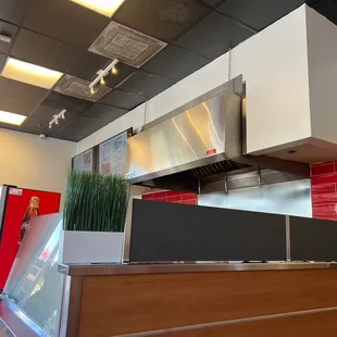 Side area of restaurant heading toward the bathroom.