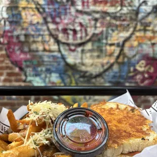 pepperoni pizza with a side of garlic fries