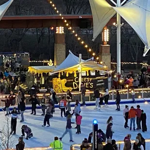 people skating on an ice rink
