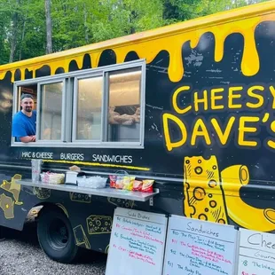 a man behind a food truck