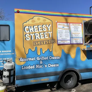 a blue and yellow food truck