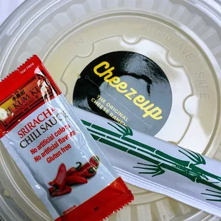 a packet of cheeze and a packet of chili salt