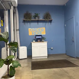 Order thru kiosk. There are a bunch of other restaurants inside