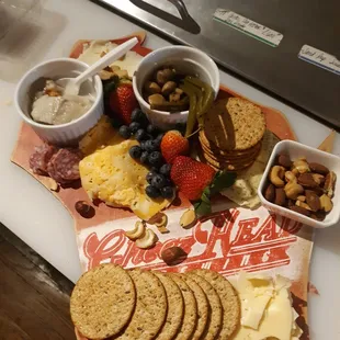 Delicious charcuterie board offering world class WI Cheez, fruits, nuts, WI Cherries &amp; Cranberries. Local, WI sourced whenever possible.