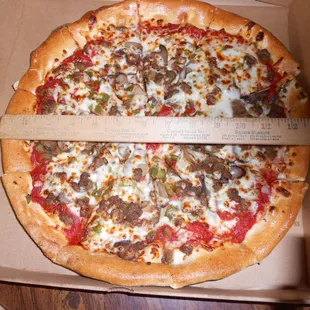 it's bigger than a 12", but not exactly a 14".