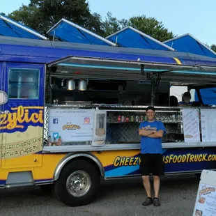 a man standing in front of it