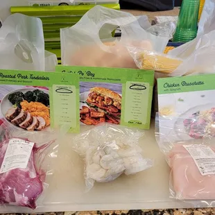 the ingredients of a meal on a cutting board