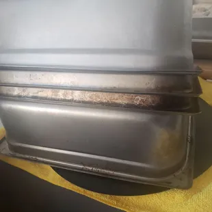 Rusty dirty greasy pans