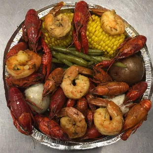 a platter of seafood and vegetables