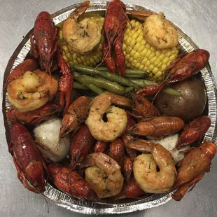 a platter of seafood and vegetables