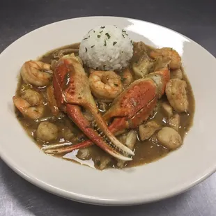 a plate of seafood and rice