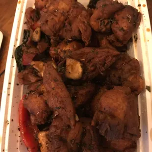 a tray of chicken wings