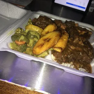 Oxtails rice and peas cabbage