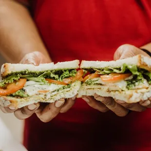 Our delish Pesto Chicken sandwich. This sandwich is made with: Marinated grilled chicken breast, swiss, lettuce, tomato, w/ pesto sauce and