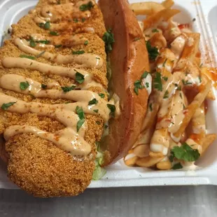 Catfish sandwich with sauced up Fry&apos;s
