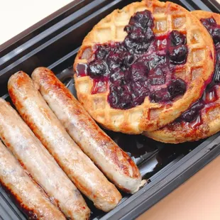 a waffle, sausages, and blueberry pie
