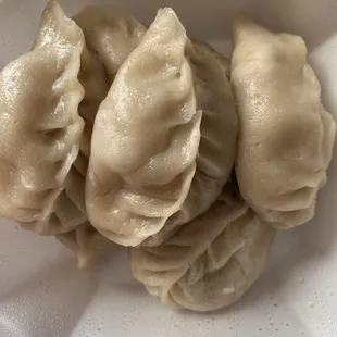 6 Steamed Vegetarian Dumplings. They were too dough-y and chewy. I don&apos;t really recommend it.