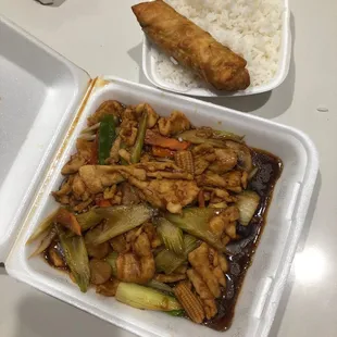 #35 Tangy Spicy Chicken (chicken breast &amp; vegetables) white rice and egg roll.