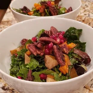 three bowls of salad