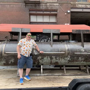 Me in front of the Smoker. There&apos;s another behind this one. Heavy AF doors!