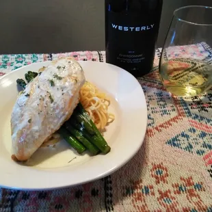 Sauteed chicken breast with asparagus, and angel hair pasta with a white wine cream sauce
