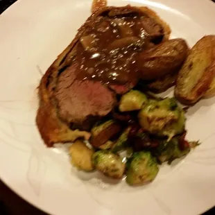 Beef wellington, roasted brussel sprouts and garlic potatoes