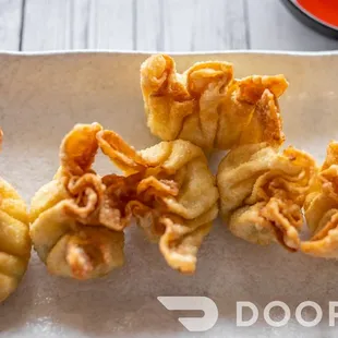a plate of fried food on a table