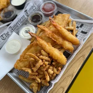 There item captains platter. Fish, shrimp, and clams.