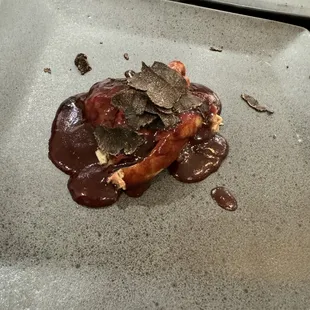 Duck leg confit, tart cherry, red plum and Pinot noir reduction with black truffle shavings