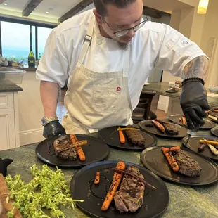 Prime New york strip, roasted farmers market carrots, saba grape must reduction, basil flowers