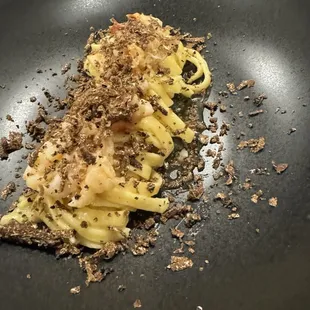Homemade tagliatelle , Belgium salted butter, lobster, fresh black truffle