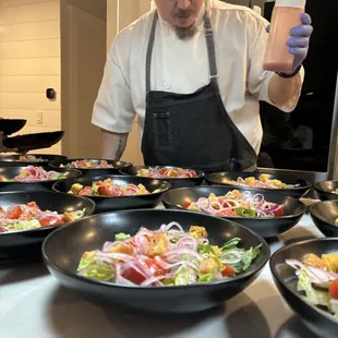 Romaine salad with home grown tomatoes, focaccia croutons from homemade focaccia, red onion and pomegranate sumac vinaigrette