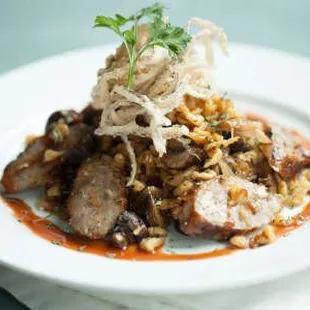 Spaetzle with Cremini mushrooms, Bratwurst, and crispy onions.