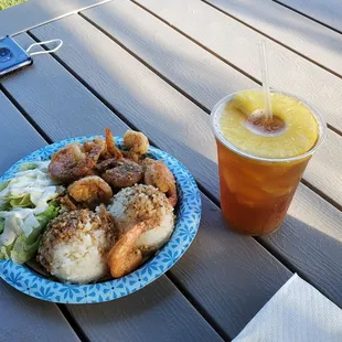Garlic shrimp with rice salad and a Plantation iced tea.