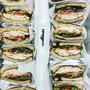 a tray full of sandwiches
