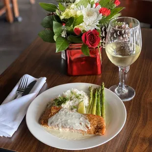 Cajun Salmon sided with grilled Asparagus and Cilantro White Rice. Nicely paired with a white wine.