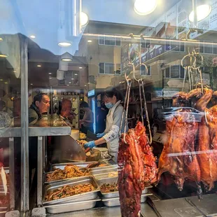 The lady from the old Wing Hing works here.