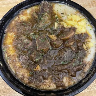 Ernie&apos;s breakfast bowl. Full size order. I believe he got ox tails. He thought shrimp &amp; grits were ordered. But, it was good!
