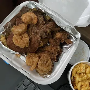 Pork chops/shrimp/Lemon pepper wings with Mac n cheese