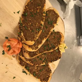 a cutting board with a variety of food items