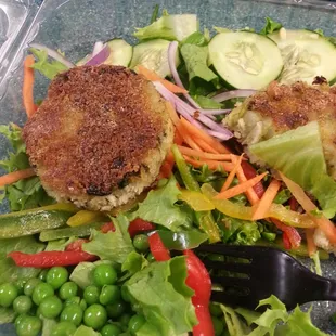 Yummy salad with seared spinach &amp; potato cakes.