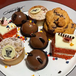 The dessert plate: Mickey Mousse Dome, Apple Crumble Tart, Strawberry Cream Cake and Chocolate Chip Cookies
