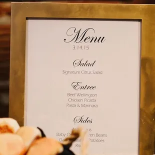 The menu for the wedding reception dinner.