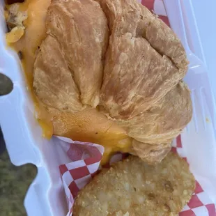 Egg and cheese croissant with hashbrown