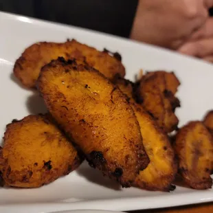 a plate of fried bananas