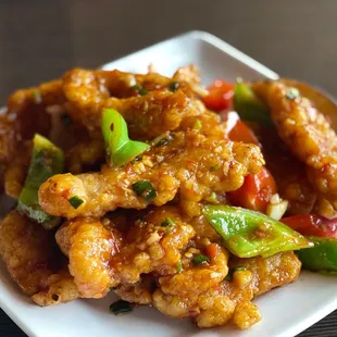 a plate of stir fried food