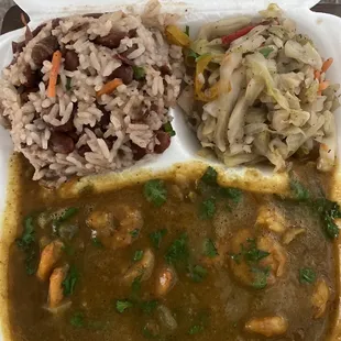 Delicious Curry Shrimp Served w/t rice &amp; peas , cabbage and plantains.