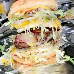 Loaded turkey Egg burger served with fries.