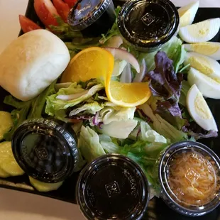 Salad with extra egg, oil and vinegar on the side